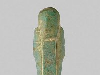 Aeg F 151 RS  Aeg F 151, Rückseite, Spätzeit, Uschebti des Hor, Mattgrüne Fayence, H 9,5 cm, B 2,4 cm, T 1,8 cm : Bestandskatalog Ägypten, Museumsfoto: Claus Cordes
